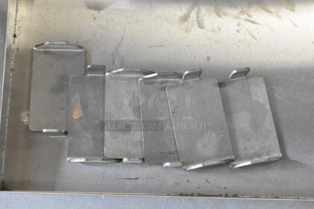 Stainless steel component of the Cooking Performance Group 351CRCPG72NL charbroiler grill, showing minor surface marks.