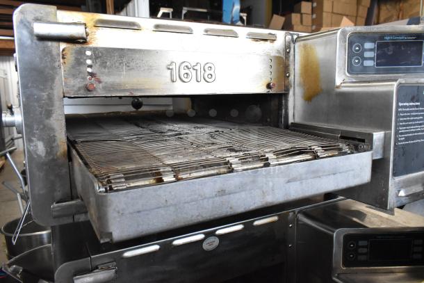 Turbochef HhC2020 stainless steel electric conveyor pizza oven on casters, 208/240V, 1 phase, commercial use. Visible control panel and conveyor belt.