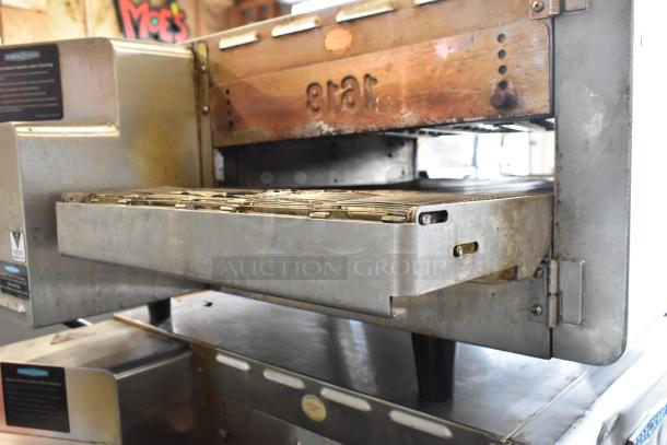 Turbochef HhC2020 stainless steel conveyor pizza oven, commercial casters, 208/240 volts, 1 phase, used condition.
