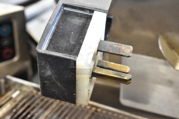 Close-up of a plug component from a 2021/2022 Turbochef HhC2020 stainless steel commercial conveyor pizza oven.