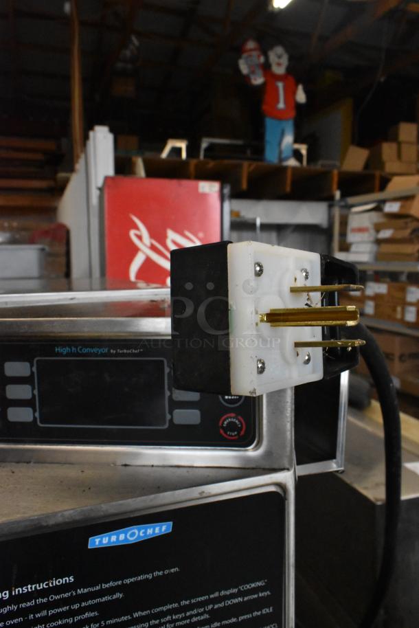 Turbochef HhC2020 stainless steel conveyor pizza oven, commercial casters, 208/240V, 1 Phase, visible control panel.