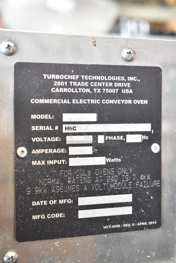 Turbochef HhC2020 stainless steel commercial conveyor pizza oven label showing model, voltage, and amperage details.