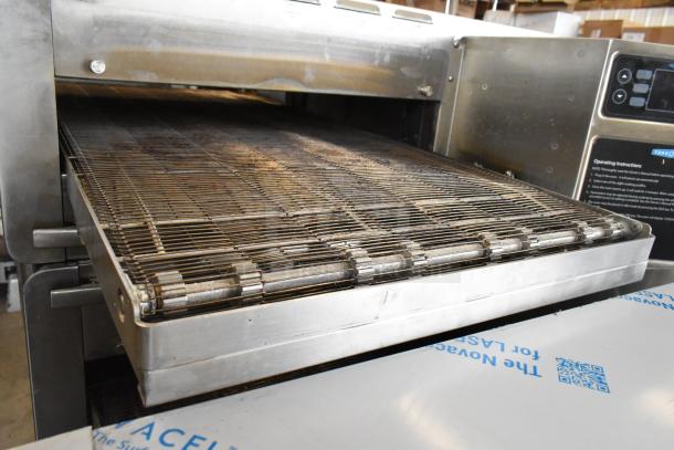 Turbochef HhC2020 stainless steel conveyor pizza oven on casters, electric, 208/240V, 1 phase, excellent condition.