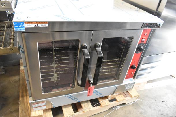 Alt text: Vulcan VC4GD-11D150K stainless steel commercial convection oven, new scratch and dent, with view-through doors and controls.