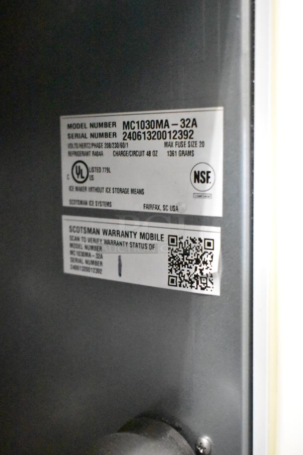 Stainless steel Scotsman MC1030MA-32A commercial ice head, scratch and dent, 208/230V 1 Phase, model and warranty labels.