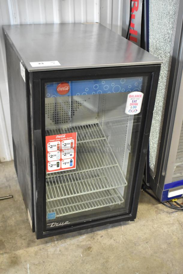 2019 True GDM-06-34-HC metal mini cooler merchandiser, glass door, 115V, 1 phase, with Coca-Cola branding, used condition.