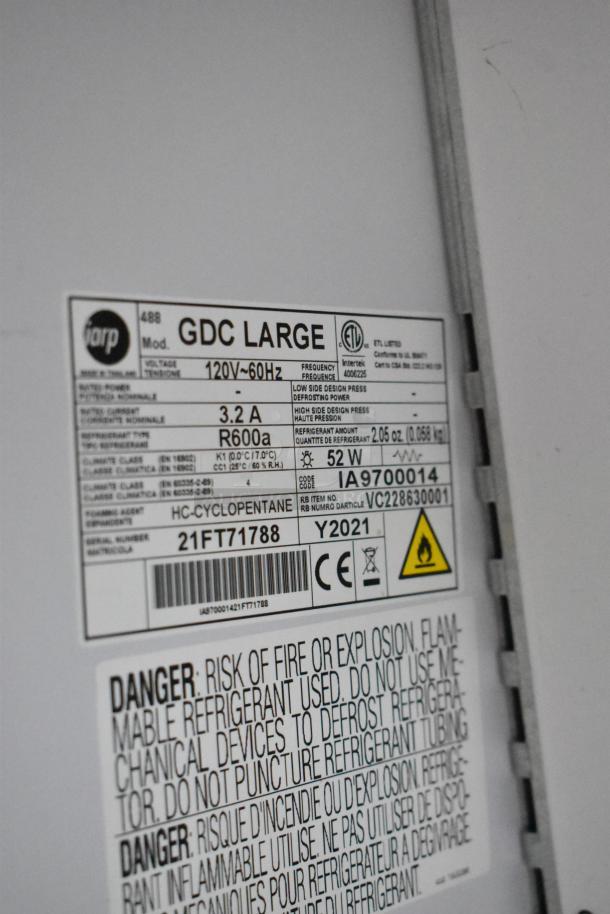 2021 Iarp GDC LARGE Metal Single Door Cooler, 115V, 1 Phase. Label indicates model and safety warnings. Broken glass noted.