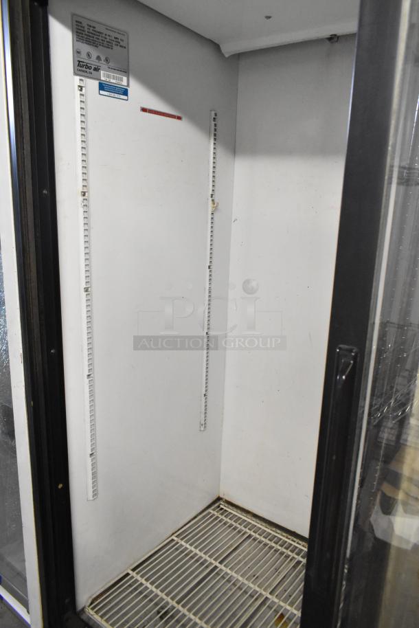 Turbo Air TGM-48R commercial cooler interior with poly coated racks. Clean, two-door, metal design. 115 volts, 1 phase.