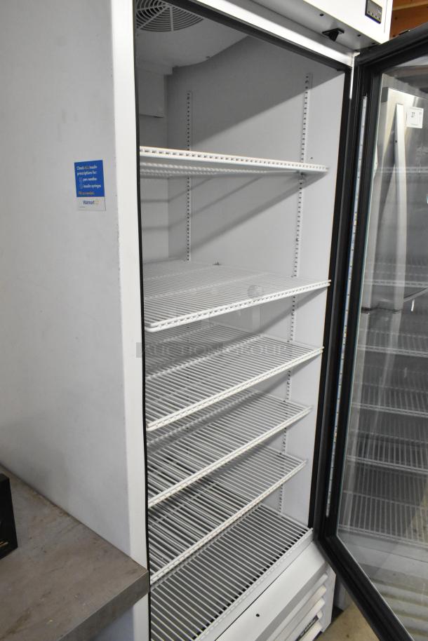 2021 True TSCI-600R-G-PH single door cooler; metal build, poly-coated racks, 115 volts, 1 phase, excellent condition.