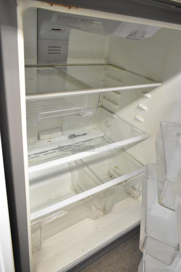 2016 Whirlpool WRT511SZDM00 stainless steel cooler with freezer, interior view. 115 Volts, 1 Phase, used condition.