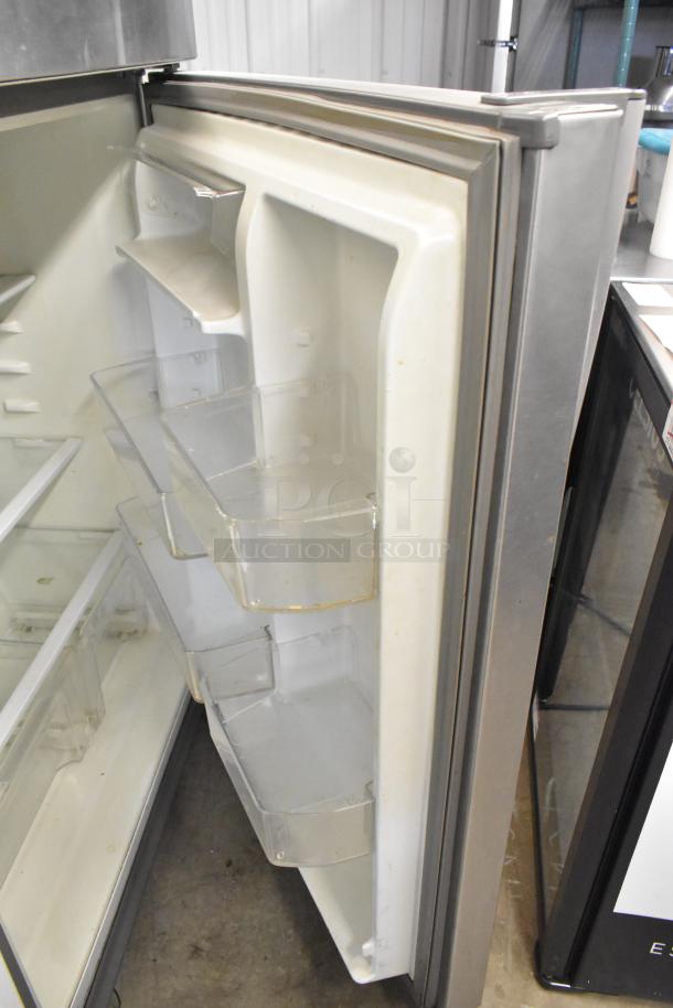 2016 Whirlpool WRT511SZDM00 stainless steel cooler with freezer. Features door shelves, 115 volts, 1 phase, good condition.
