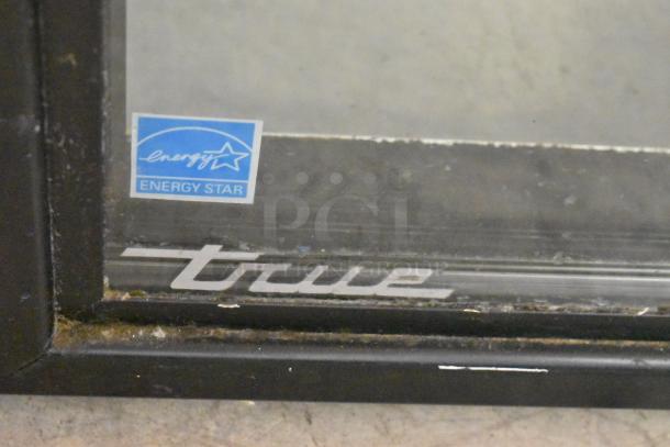 2018 True GDM-06-34-HC mini cooler, Energy Star rated, metal frame. Visible brand logo and slight wear.