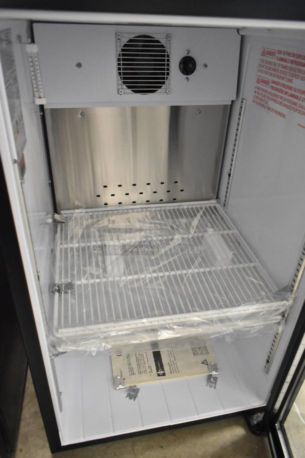 2024 QBD DC6LP-HC Metal Mini Cooler Merchandiser, 115V, 1 Phase. Features shelving and interior fan. Appears new.
