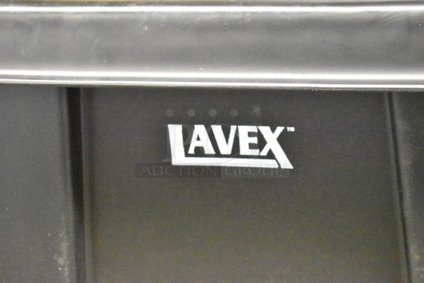 Lavex black poly tilt truck with commercial casters, showing brand logo. Brand new condition, scratch and dent marked.