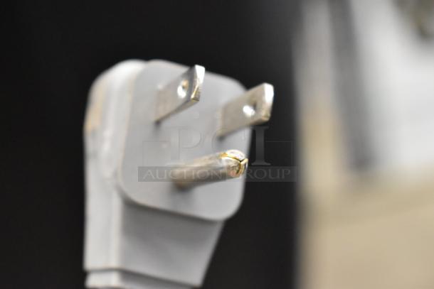 Close-up of a power plug for the KoolMore KM-MD-1SS stainless steel microwave drawer, 120 volts, 1 phase.
