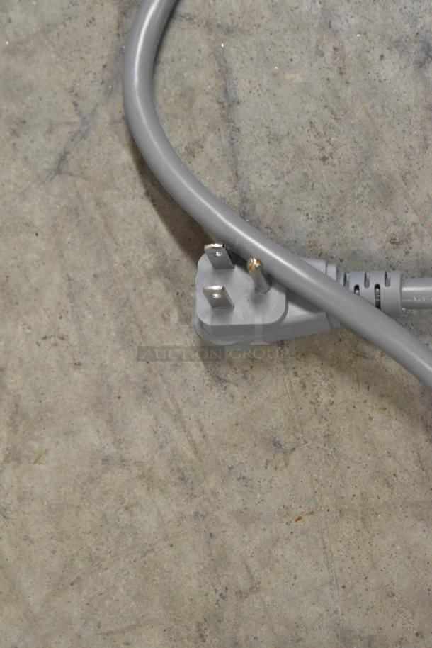 The image shows the power cord of a KoolMore KM-MD-1SS stainless steel commercial microwave drawer. 120 volts, 1 phase.