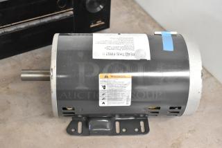 Brand new US Motors Polyphase Motor; 200-230/480V, scratch and dent condition, includes warning label.