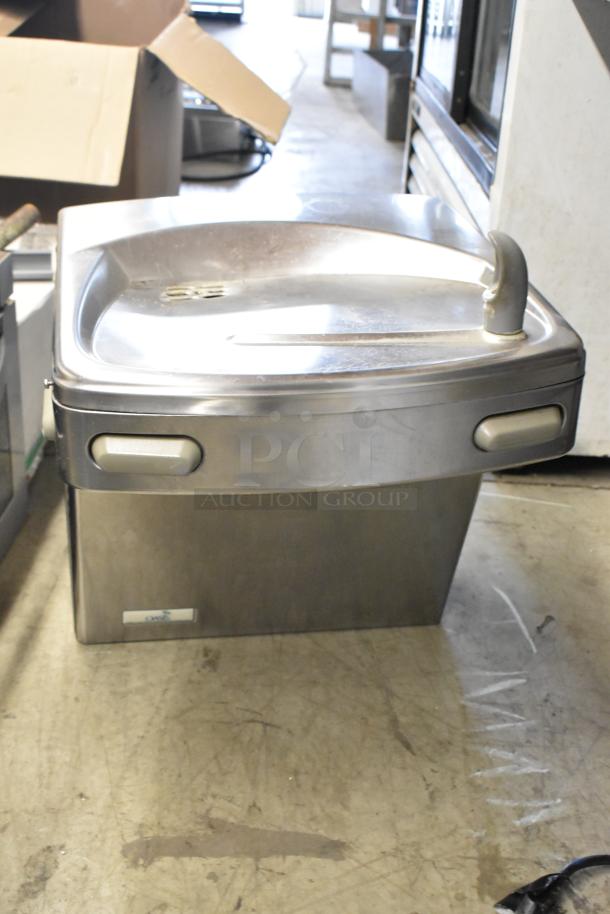 Brand new Oasis PG8AC Versacooler II 8 GPH stainless steel drinking fountain. Scratch and dent condition, 115V, 1 phase.