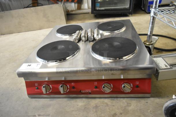 Brand new Avantco 177CER400 stainless steel 4-burner electric range, 208/240V, 1 Phase, solid French-style, minimal scratches.