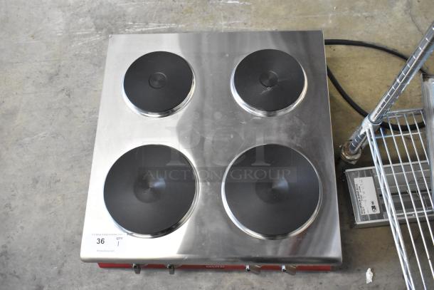 Brand new Avantco 177CER400 stainless steel 4-burner French-style electric range, scratch and dent condition, 208/240V, 1 phase.