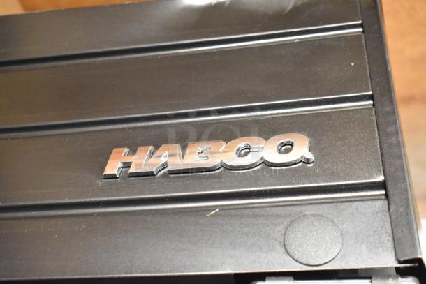 2019 Habco SE18 commercial cooler, metal body with poly-coated racks, single door. Features Habco logo. 115 volts, 1 phase.