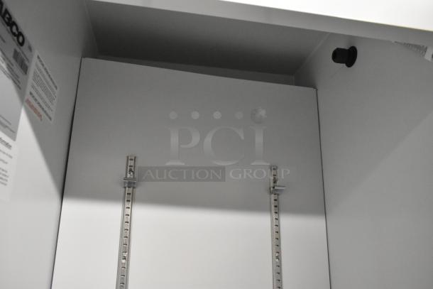 2019 Habco SE18 commercial single door reach-in cooler interior, metal design, adjustable racks, 115V, 1 phase power.