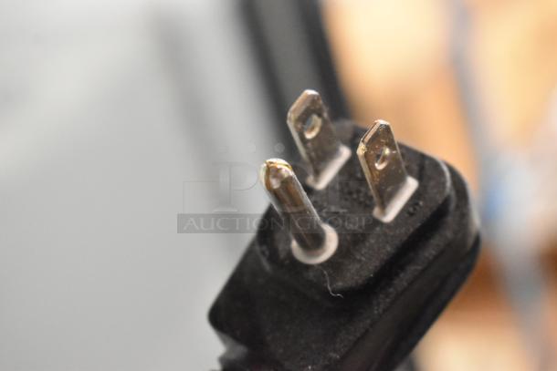 Close-up image of a power plug, related to the 2019 Habco SE18 Cooler, indicating its compatibility with 115 Volts, 1 Phase.