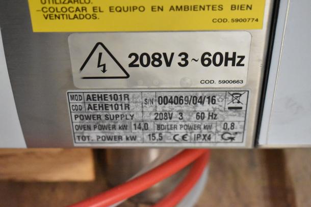Bakers Pride AEHE101R combi convection oven label, showing model, 208V, 3 phase, 60Hz, 14.0 kW, new scratch and dent.