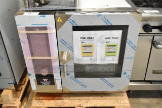 BRAND NEW Bakers Pride AEHE061R stainless steel combi convection oven, electric, 208V, 3-phase, with protective wrapping.