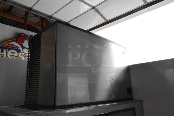 Manitowoc stainless steel commercial ice head on bin, 208-230V, 1 phase, in used condition.