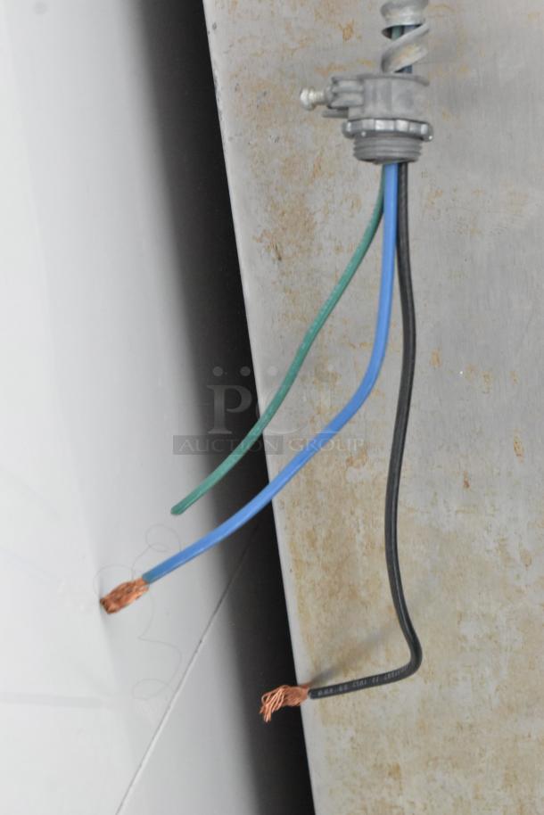 Manitowoc stainless steel commercial ice head on bin, 208-230V, 1 phase, visible wiring, good condition.