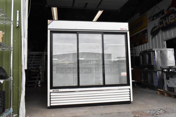 Turbo Air TGM-69R 3-door reach-in cooler merchandiser with poly coated racks, 115V, 1 phase, metal exterior.