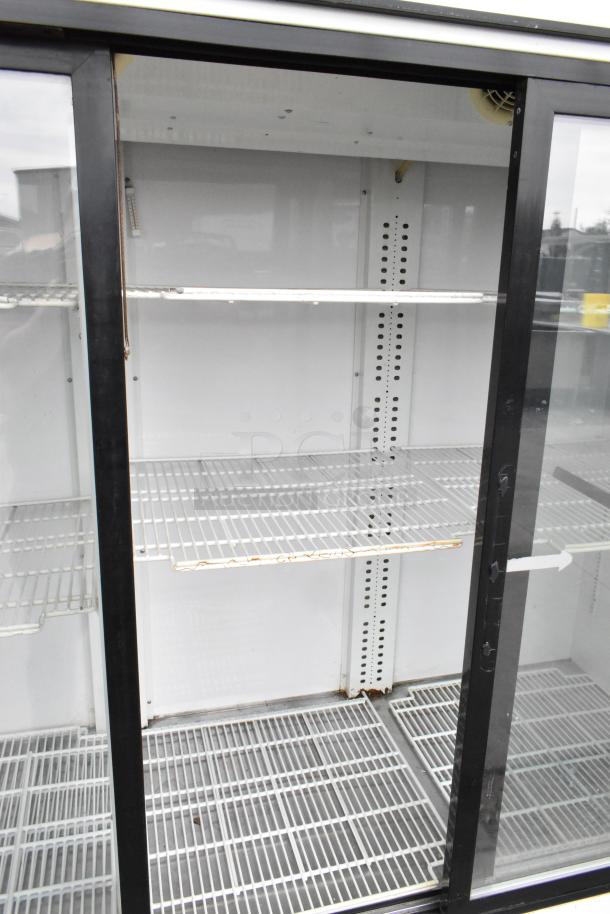 Turbo Air TGM-69R 3-door reach-in cooler with poly-coated racks, metal exterior, 115V, 1 phase, used condition.