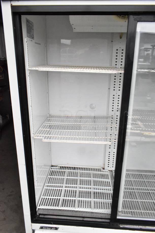 Turbo Air TGM-69R commercial 3-door reach-in cooler with poly-coated racks, 115 volts, 1 phase.