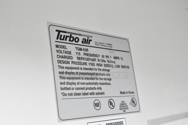 Turbo Air TGM-69R label, 115V, 1-phase, lists specs: R-134a refrigerant, 18.34oz, 60Hz, 12 amps. Made in Korea.