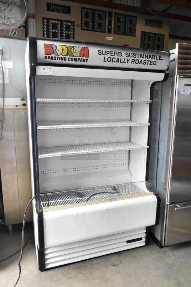 True TAC-48GS-LD commercial open merchandiser, 115V, 1 phase, five shelves, Brooklyn Roasting Company branding, used.