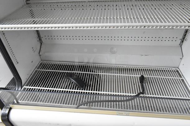 True TAC-48GS-LD commercial open grab-n-go merchandiser, white metal shelves, 115V, 1-phase, used condition.