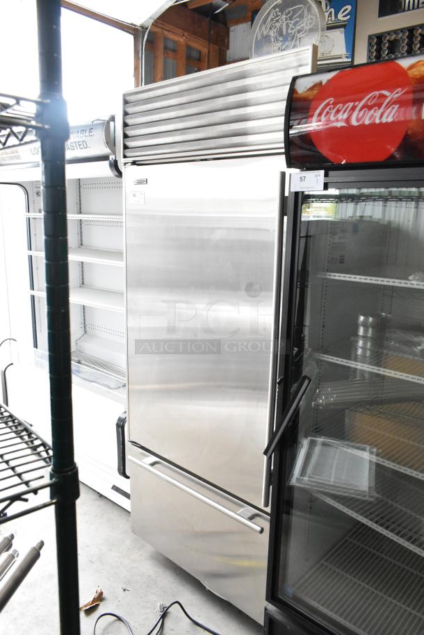 Sub Zero 650/S 2 stainless steel cooler with freezer drawer, 115 volts, 1 phase, sleek design, excellent condition.