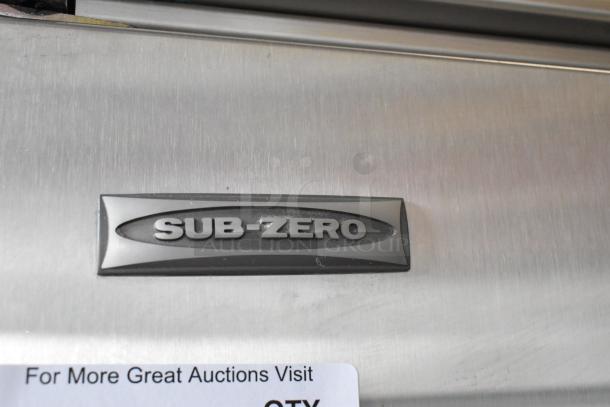 Sub Zero 650/S 2 stainless steel cooler with freezer drawer, 115 volts, 1 phase, in good condition. Sub Zero logo visible.