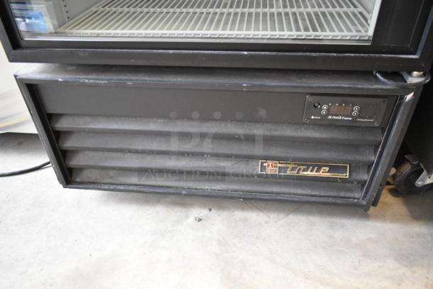 True GDM-26EM metal single door reach-in cooler, poly coated racks, digital controls, 115V, used, good condition.