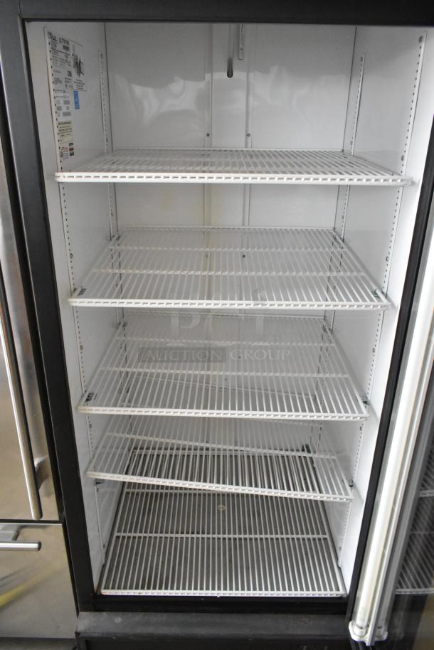 True GDM-26EM commercial single door cooler with poly-coated racks, metal frame. Capacity: 115 volts, 1 phase.