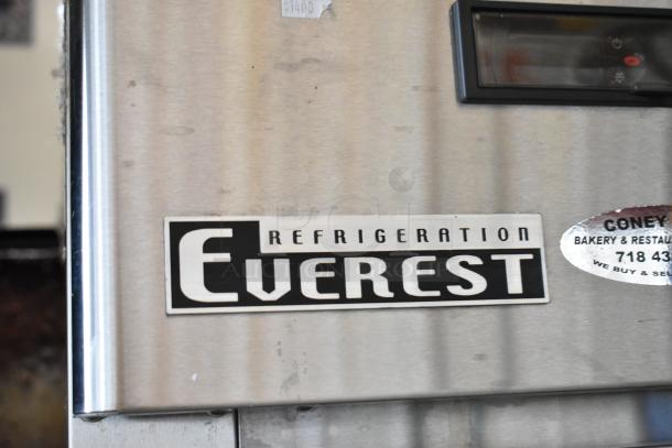 Everest ESRFH2 stainless steel commercial refrigerator/freezer, dual temperature, commercial casters, visible logos.