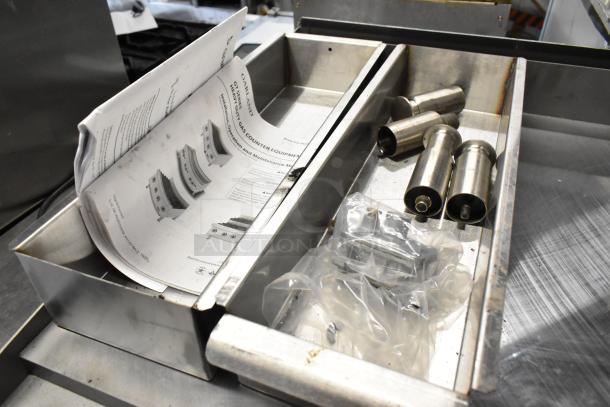 Garland Stainless Steel Commercial Gas Flat Top Griddle with maintenance manual and accessories in tray, good condition.
