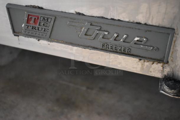 2017 True TWT-67F stainless steel 2-door undercounter freezer, commercial casters, 115V, visible manufacturing label.