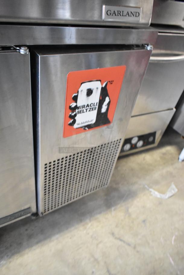 2017 True TWT-67F stainless steel 2-door undercounter freezer, commercial casters, 115 volts, 1 phase, red sticker on door.