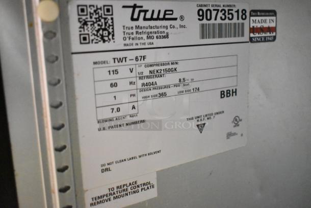 2017 True TWT-67F stainless steel 2-door undercounter freezer, commercial casters, 115V, 1 phase, model details visible.