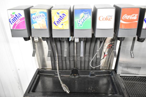 2 stainless steel commercial beverage machines on ice bin with Cornelius CB1522AHK6, 6 flavors, 115 volts, 1 phase.