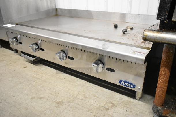 Atosa Stainless Steel Commercial Gas Griddle, countertop model, flat top, adjustable knobs, used condition, sturdy construction.