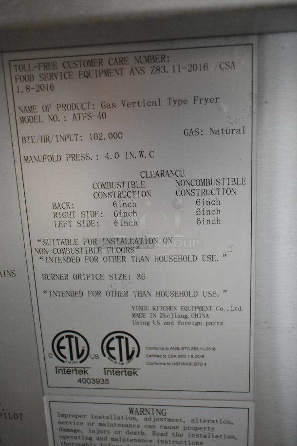 Cook Rite ATFS-40 deep fat fryer label shows 102,000 BTU, natural gas, and safety clearances. Made for commercial use.
