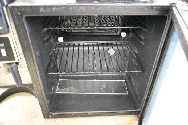 Haier HBCN02EBB Metal Mini Cooler Merchandiser, 115V, 1 Phase, open door view showing interior shelves.